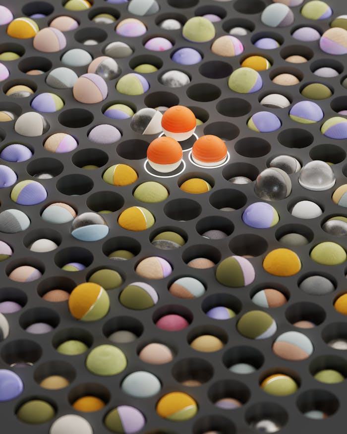 about-us Vibrant abstract image featuring colorful, textured 3D spheres arranged on a perforated surface.